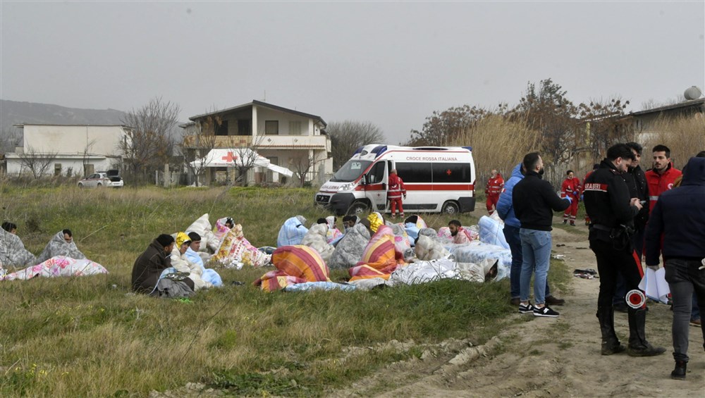 Dozens found dead in southern Italy after migrant boat sinks in rough seas