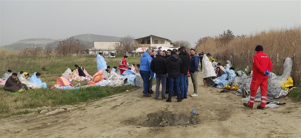 Dozens found dead in southern Italy after migrant boat sinks in rough seas