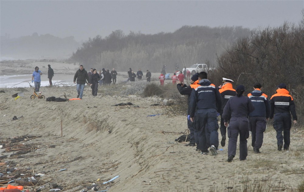 Dozens found dead in southern Italy after migrant boat sinks in rough seas