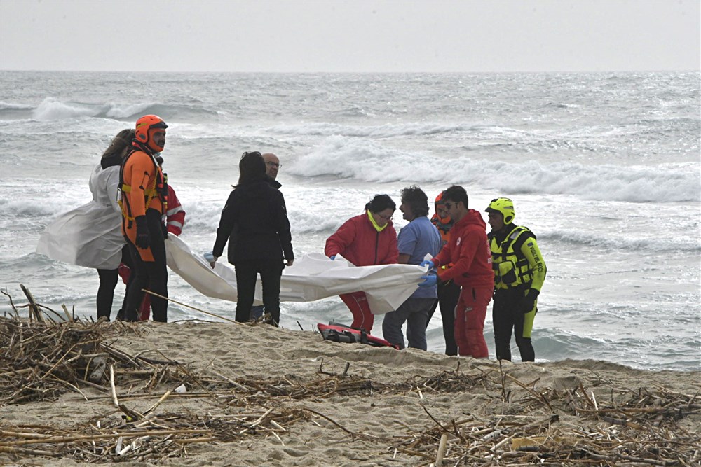 Dozens found dead in southern Italy after migrant boat sinks in rough seas