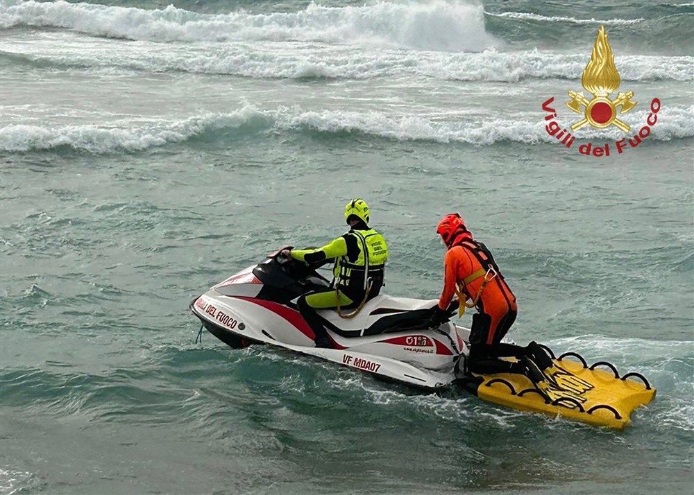 Dozens found dead in southern Italy after migrant boat sinks in rough seas