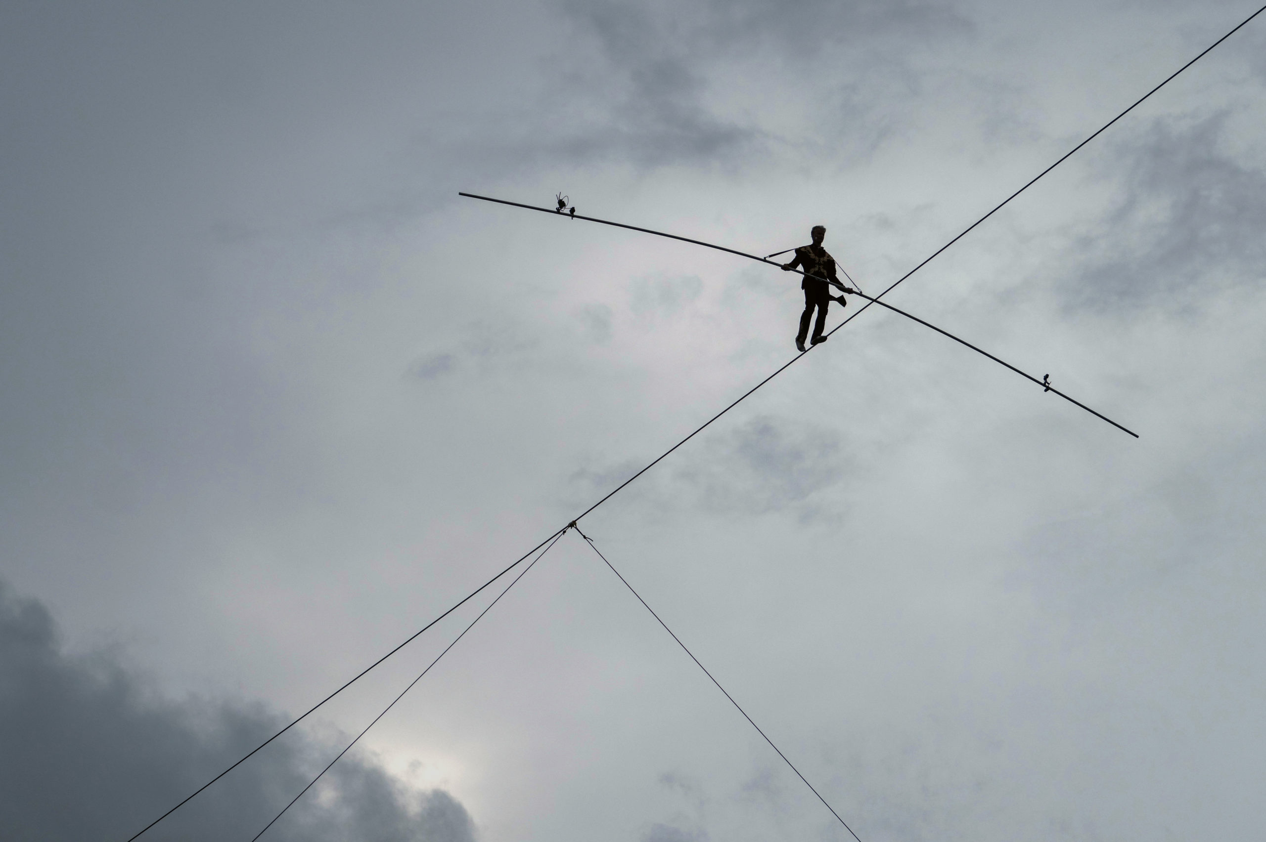 Acrobat Laszlo Simet walks on a wire rope to mark the World Circus Day in Budapest